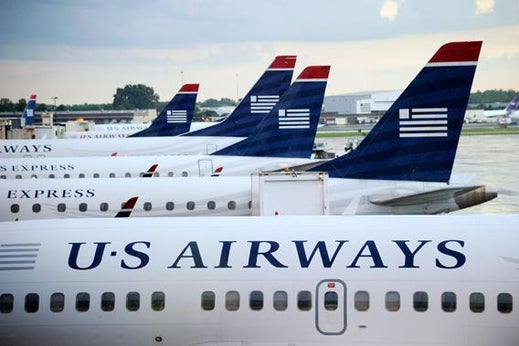 U.S. Airways planes sit on the tarmac at Charlotte/Douglas International Airport in September 2012 in Charlotte, North Carolina.